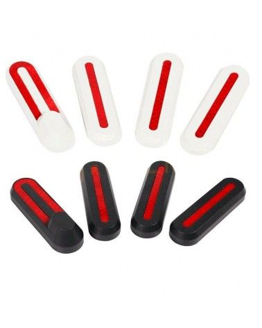 Juego de embellecedores cubre tornillos para patinete eléctrico con adhesivos reflectantes.